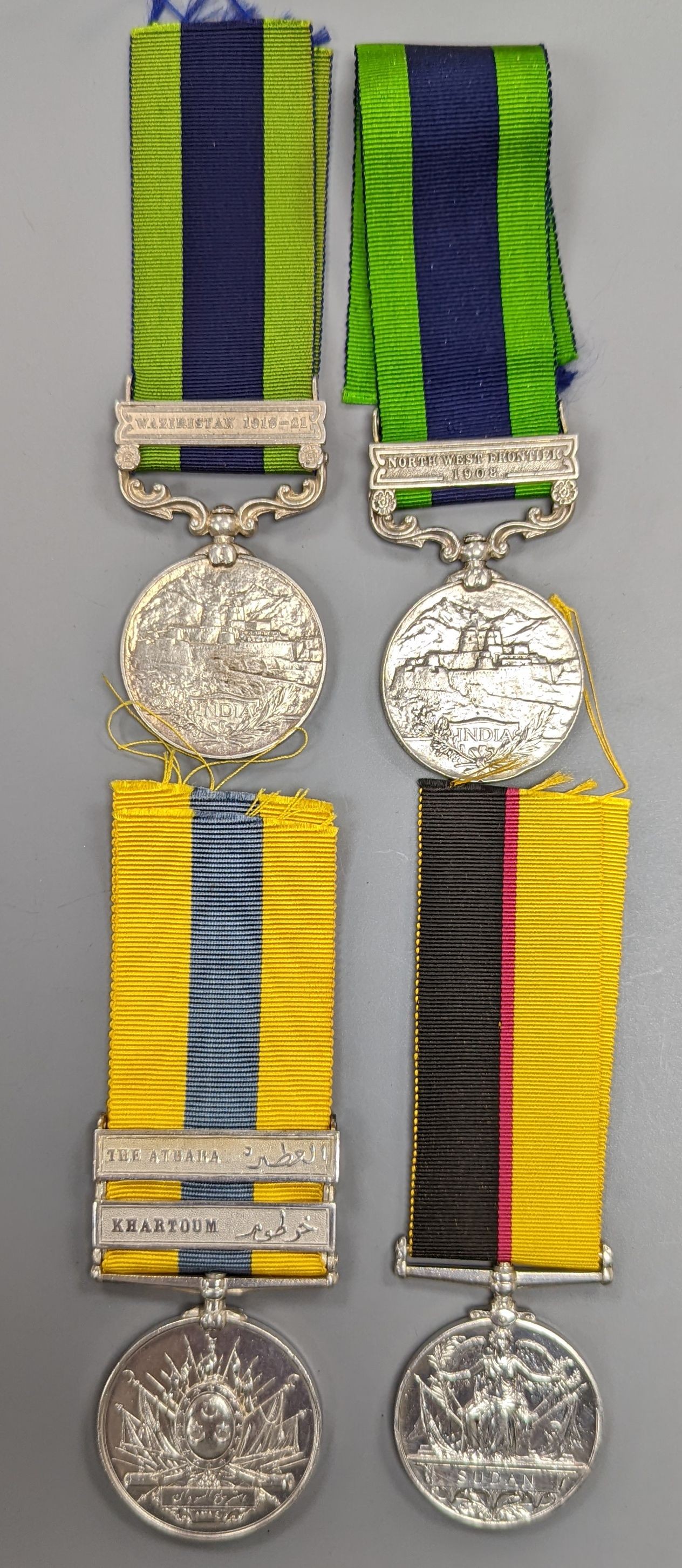 An Edward VII India GSM with North West Frontier 1908 clasp to 678 PTE. G. BAGNELL I/RL WARWICK REGT., a George V India GSM with Waziristan 1919-21 clasp to MTCD-33318 PEON BHAGELLOO I.A.S.C. , a Victoria Sudan medal and